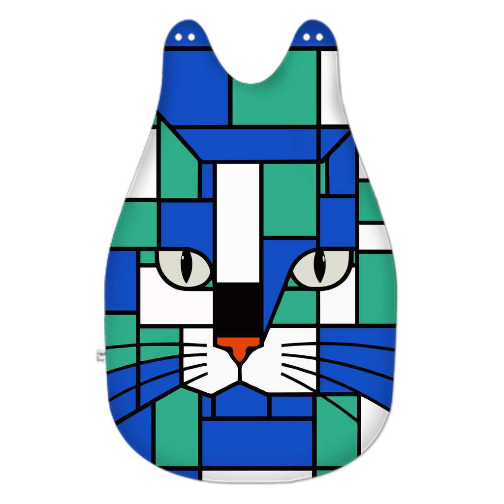 A teardrop-shaped bib or apron with a colorful geometric cat face print in blue, green, white, black, and orange, shown against a plain white background.
