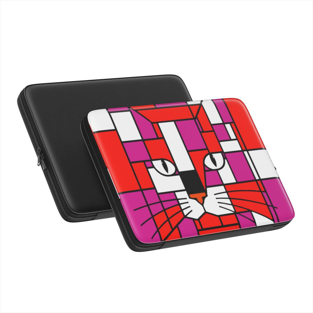 exterior detail of the blood orange, neon red and purple geometric cat face premium laptop sleeve showing the padded lining and protective construction and black rear cover