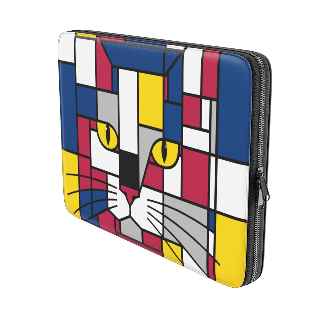 Side view of the Carnival geometric cat face premium laptop sleeve in dark red, blue and yellow, highlighting its slim profile and premium zip closure