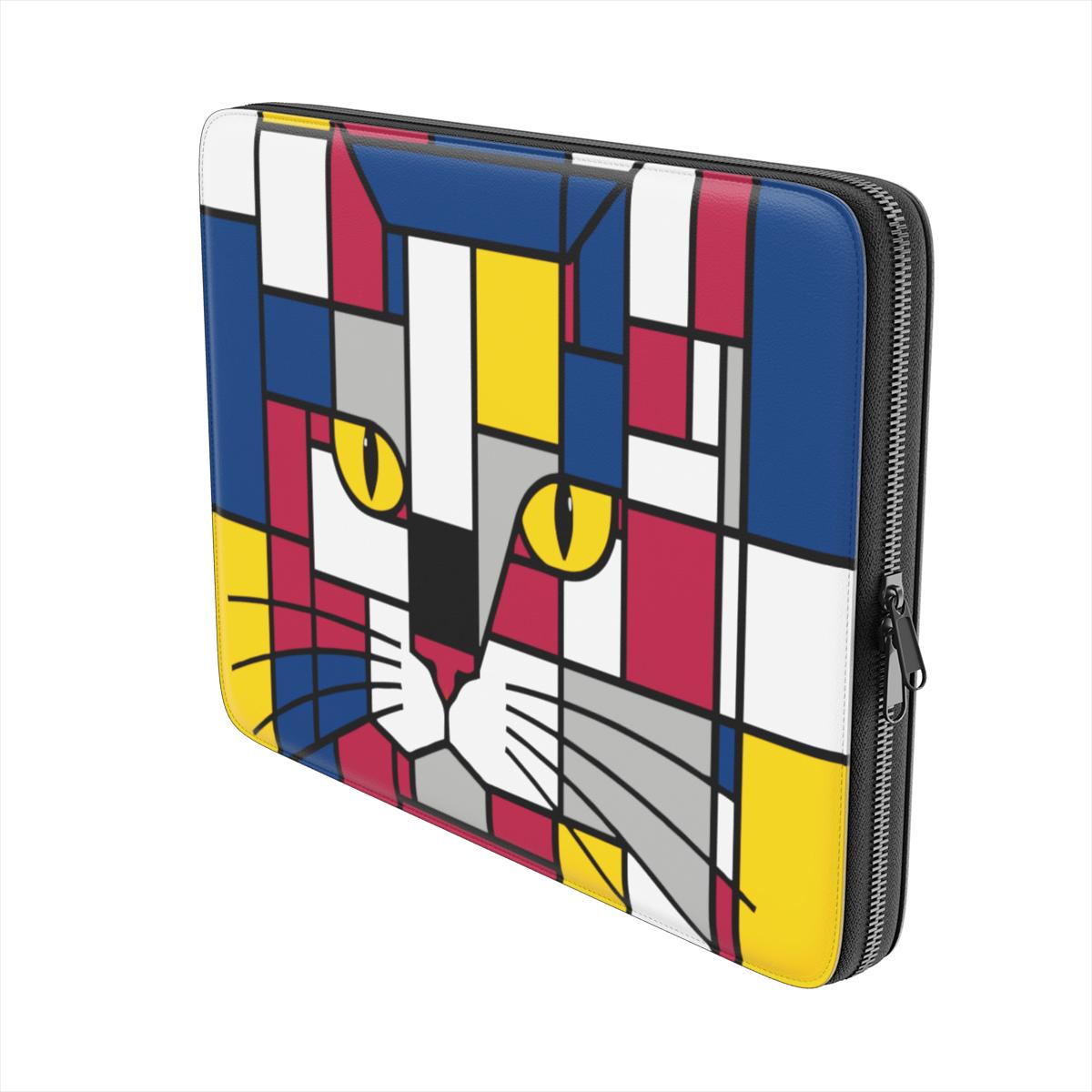 Side view of the Carnival geometric cat face premium laptop sleeve in dark red, blue and yellow, highlighting its slim profile and premium zip closure
