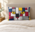 pillow on bed -red blue yellow cat