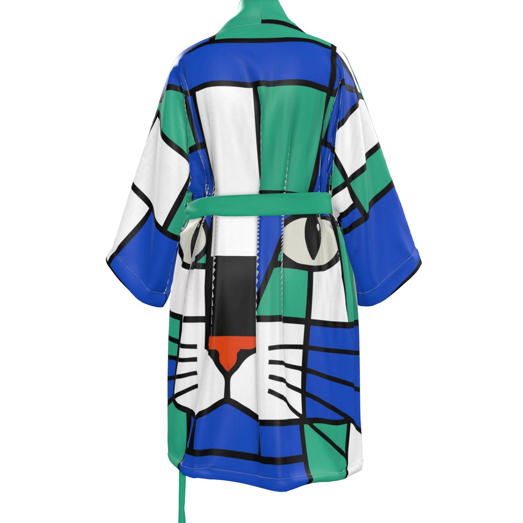 A kimono with a colorful geometric cat face print in blue, green, white, black, and orange, featuring a green belt, shown on a white background.