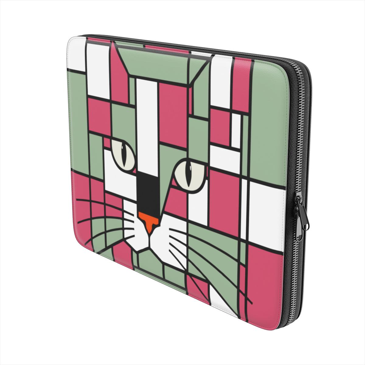 Side view of the red, terracotta, forest green and olive geometric cat face premium laptop sleeve, highlighting its slim profile and premium zip closure.