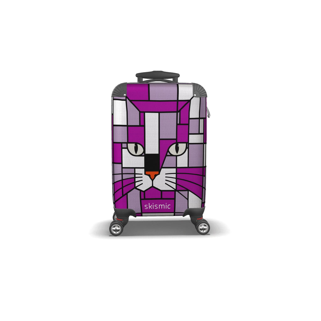 A hard-shell suitcase with a purple, gray, and white geometric cat face design, featuring the brand name 'skismic' on the front, set against a plain white background.